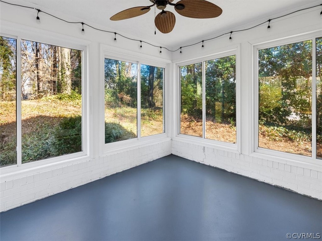7532 Marilea Road Richmond, VA 23225 - Photo 32 of 37 Enclosed porch with ceiling fan and sliding windows.