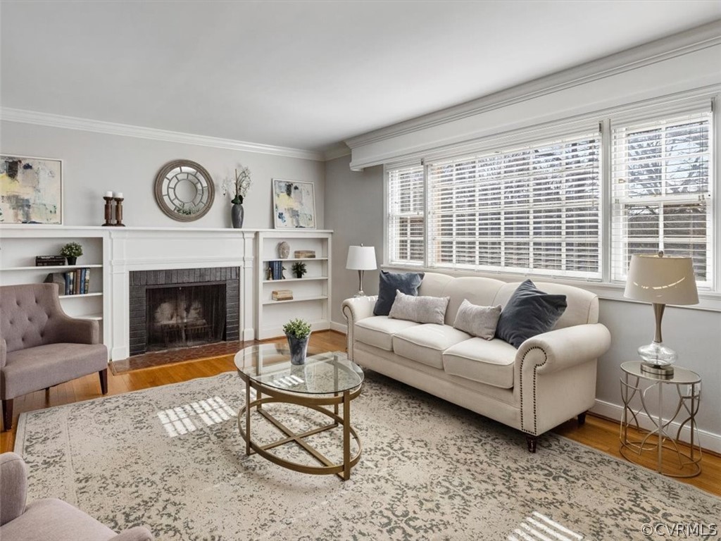 Oak floors, picture window, wood burning fireplace