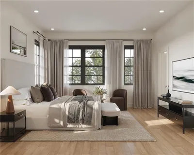 a bedroom with a bed and glass window