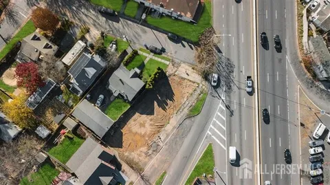 an aerial view of a house with a garden