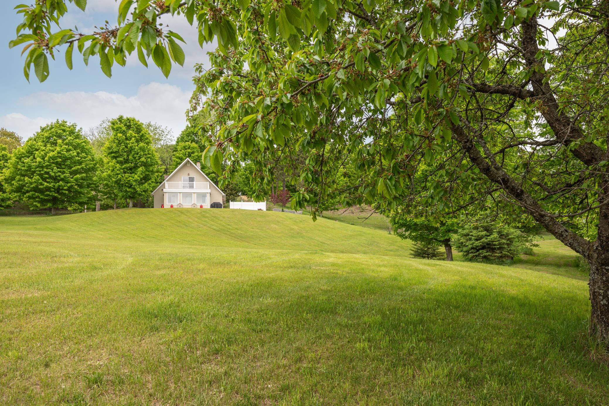 6921 Cram Road Williamsburg, MI 49690 - Photo 3 of 43