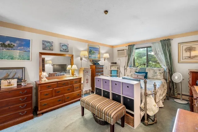 a room with furniture or couch and a window