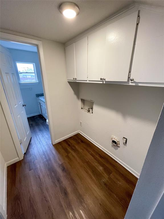 1016 West Gandy Street, Unit 4 Denison, TX 75020 - Photo 11 of 11 a view of an empty room with wooden floor and a window