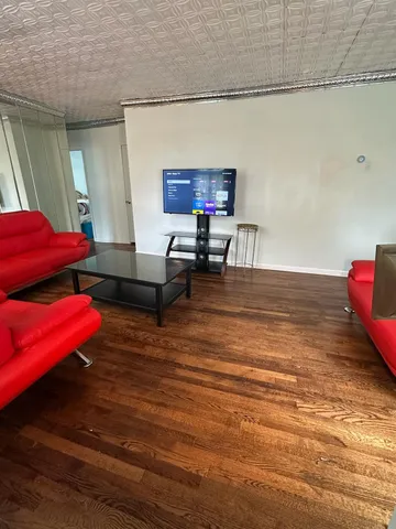 a living room with furniture and a couch