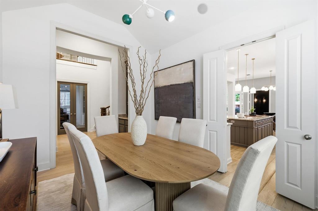 1933 Snapdragon Road Frisco, TX 75033 - Photo 5 of 40 Dining area with wood-finish flooring, a contemporary chandelier, and recessed lighting