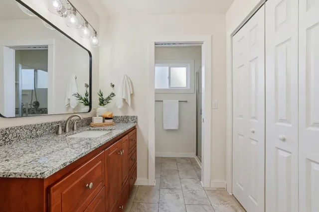 a view of a backyard with table and chairs
