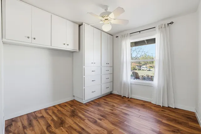 a view of a house with backyard porch and garden