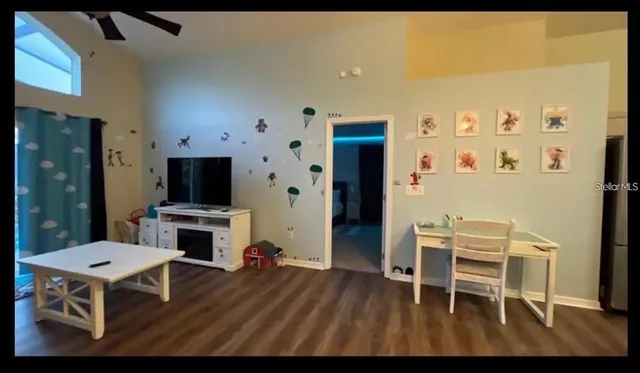 a view of a dining room with furniture window and outside view