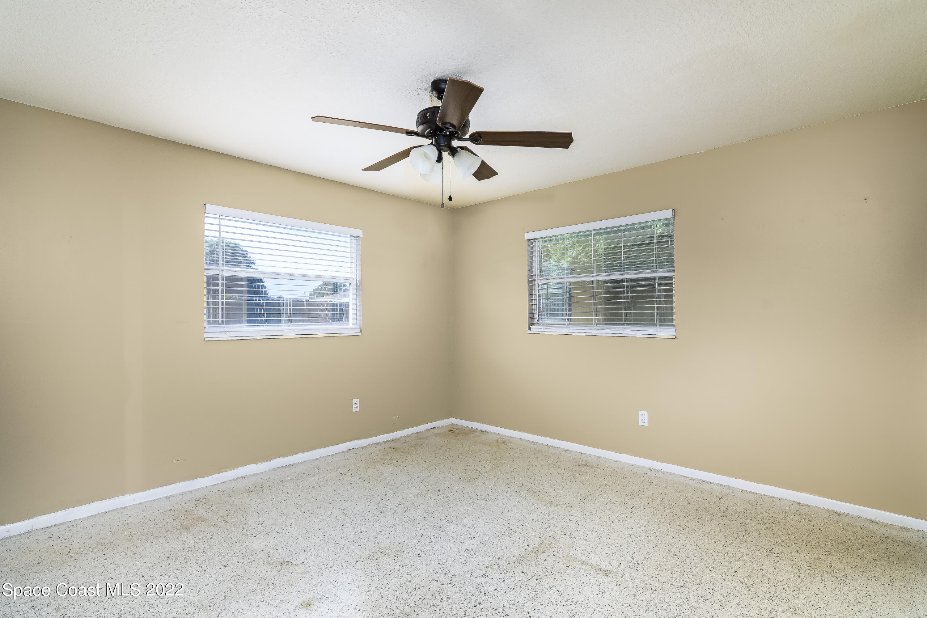 2389 Ricky Road Melbourne, FL 32935 - Photo 11 of 21 a view of an empty room with a window
