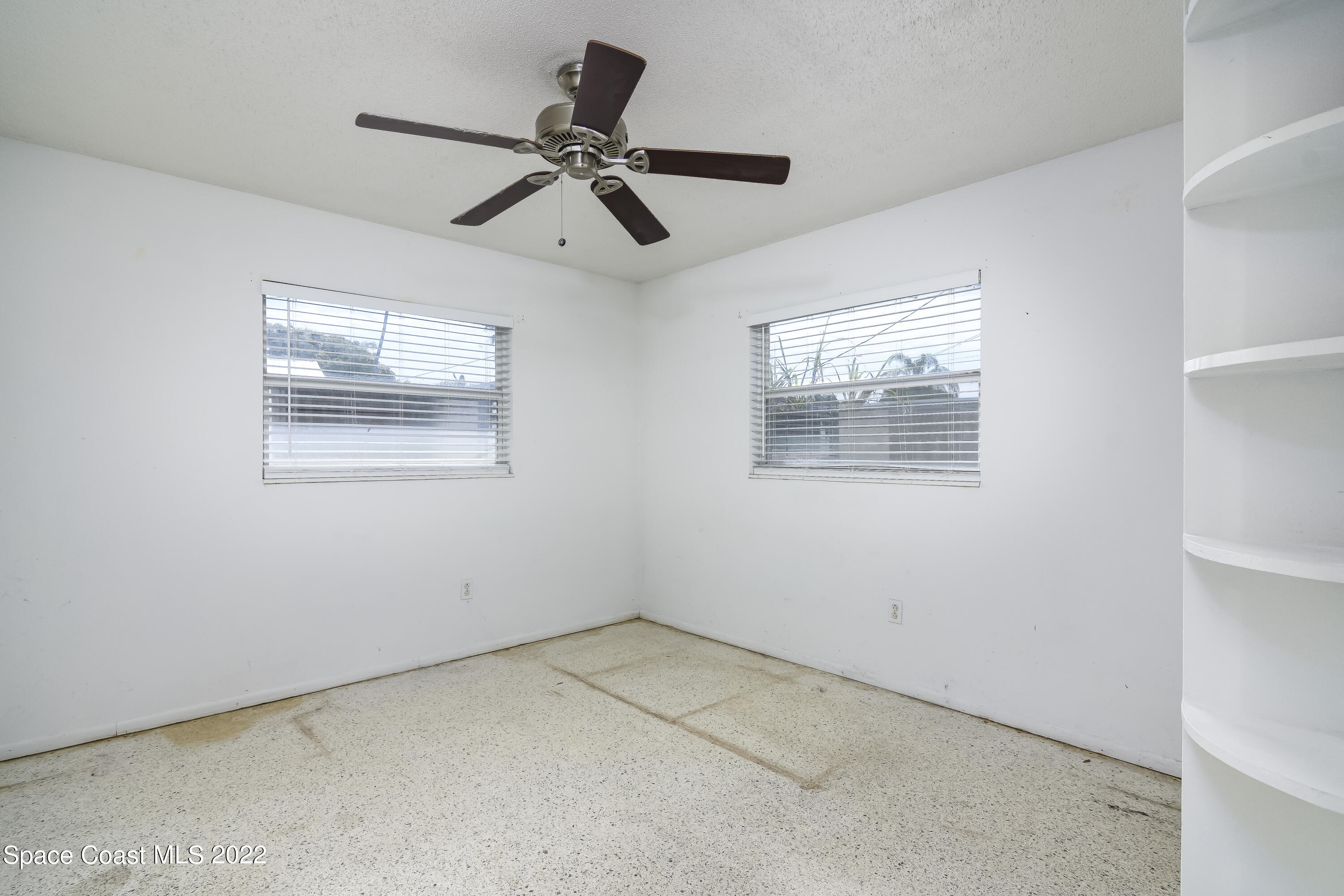 2389 Ricky Road Melbourne, FL 32935 - Photo 15 of 21 a view of an empty room with a window