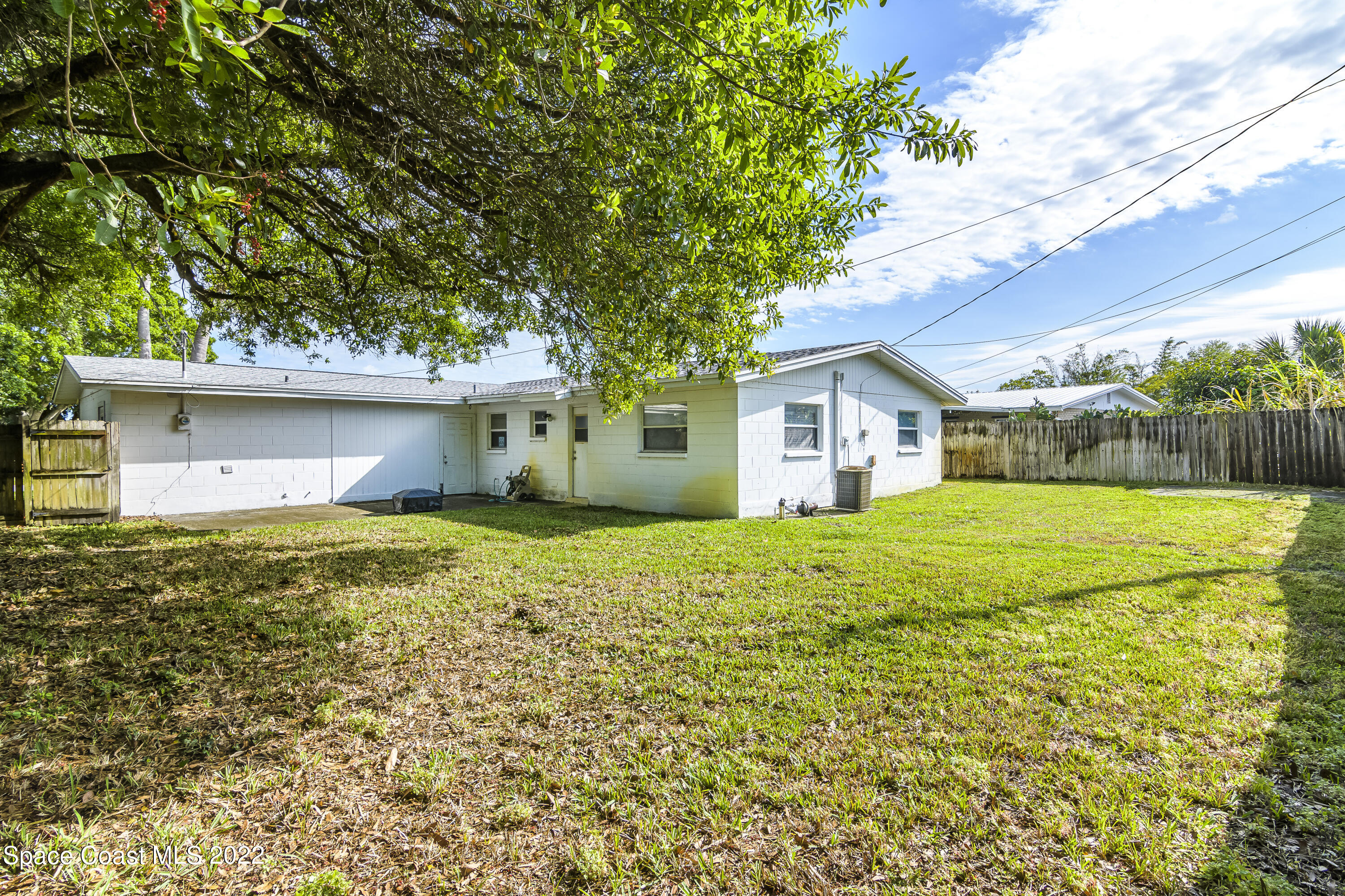 2389 Ricky Road Melbourne, FL 32935 - Photo 17 of 21 a house view with a garden space