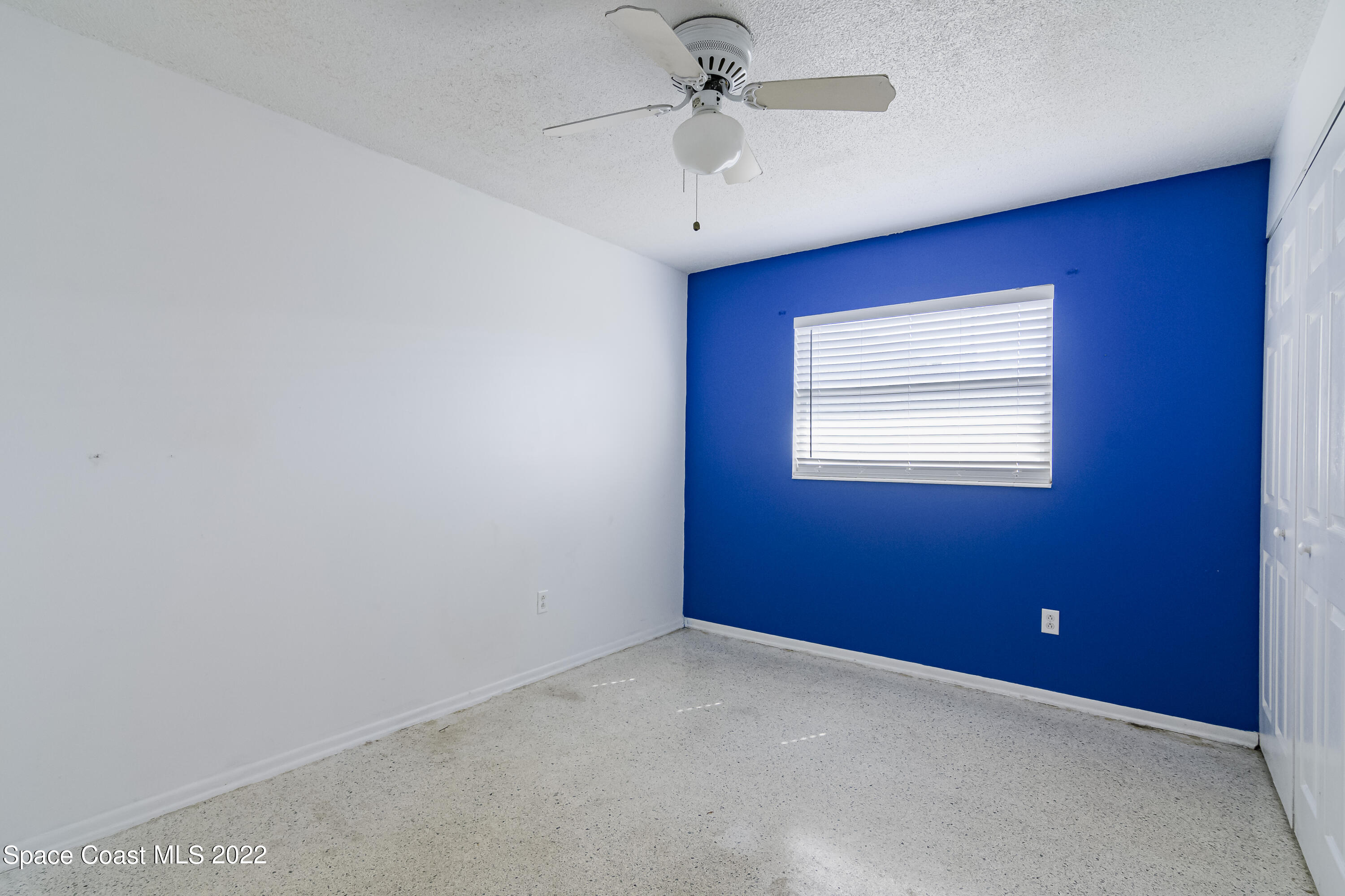 2389 Ricky Road Melbourne, FL 32935 - Photo 9 of 21 a view of an empty room with a window