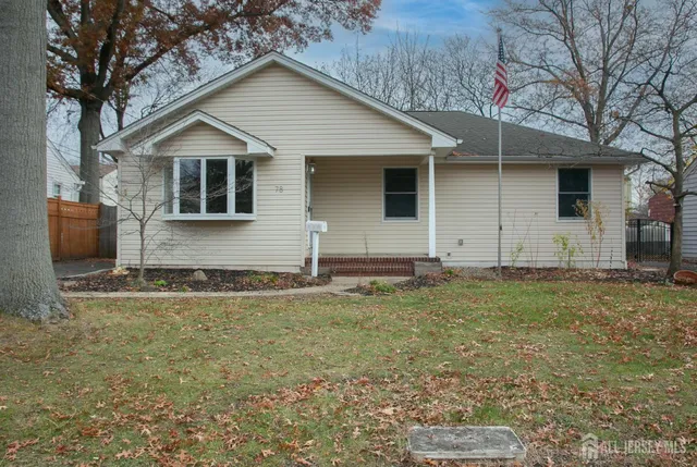 a view of a backyard of the house