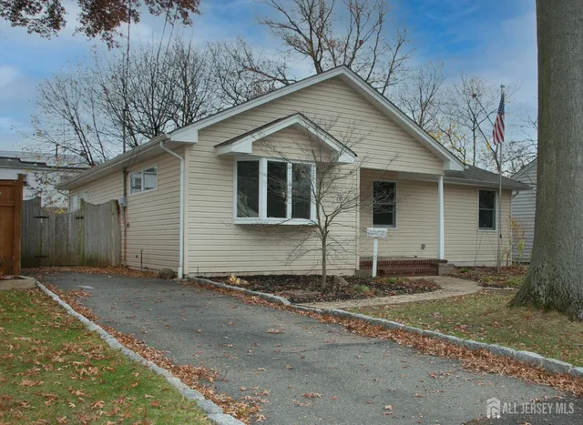 a view of a small white house