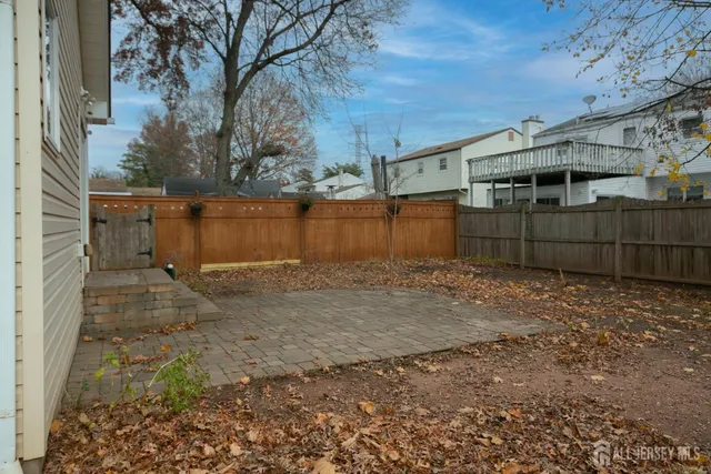 a view of a backyard of the house