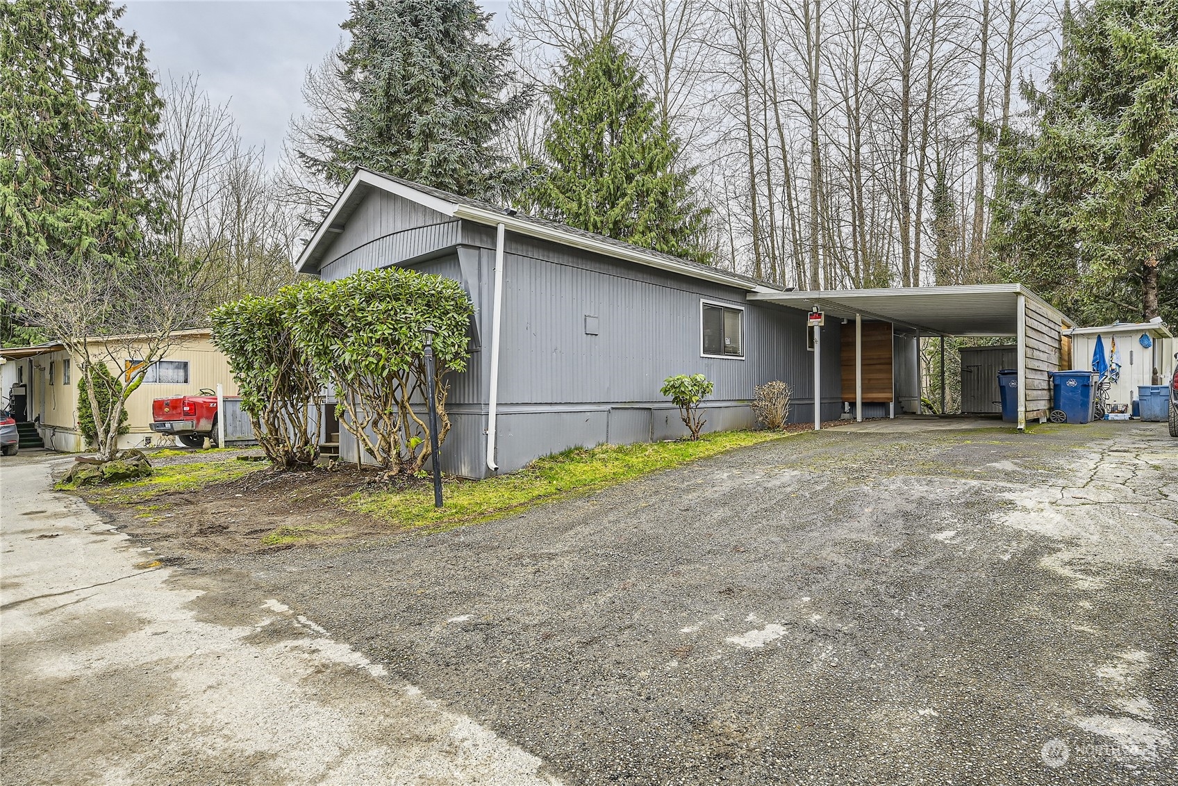 a house with trees in the background