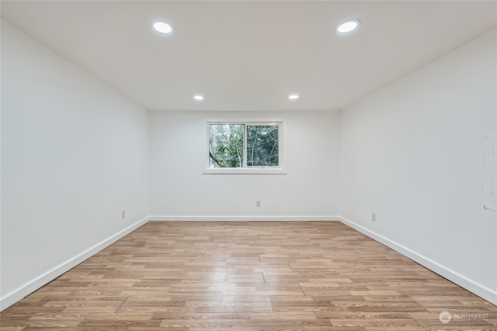 1332 192nd Street Southeast, Unit 17 Bothell, WA 98012 - Photo 15 of 24 a view of empty room with wooden floor and fan