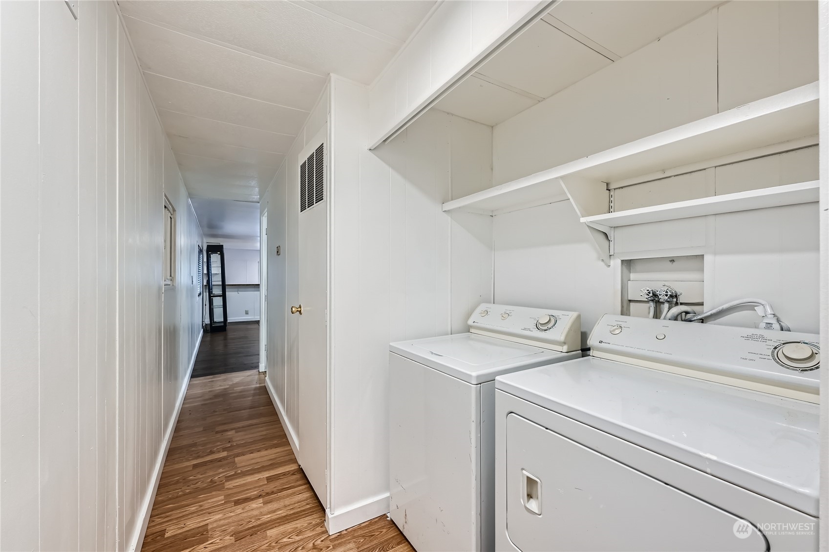 1332 192nd Street Southeast, Unit 17 Bothell, WA 98012 - Photo 21 of 24 a view of storage and utility room with washer and dryer