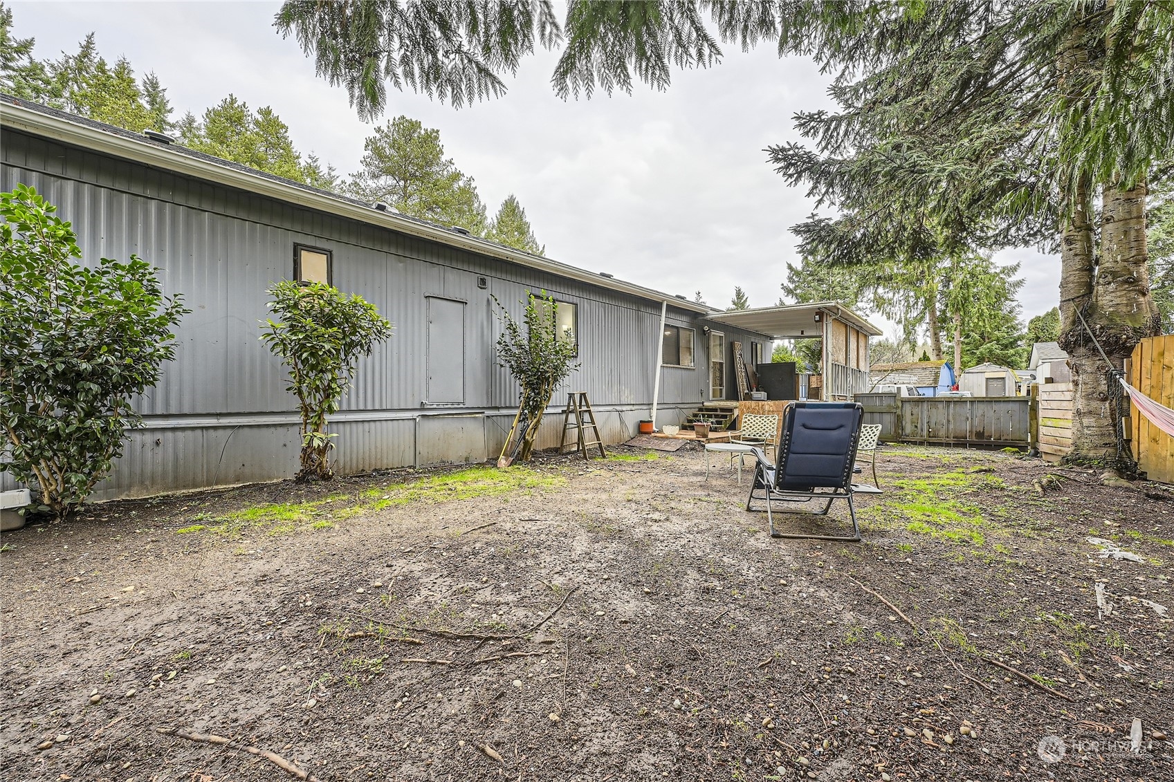 1332 192nd Street Southeast, Unit 17 Bothell, WA 98012 - Photo 23 of 24 a backyard of a house with seating space