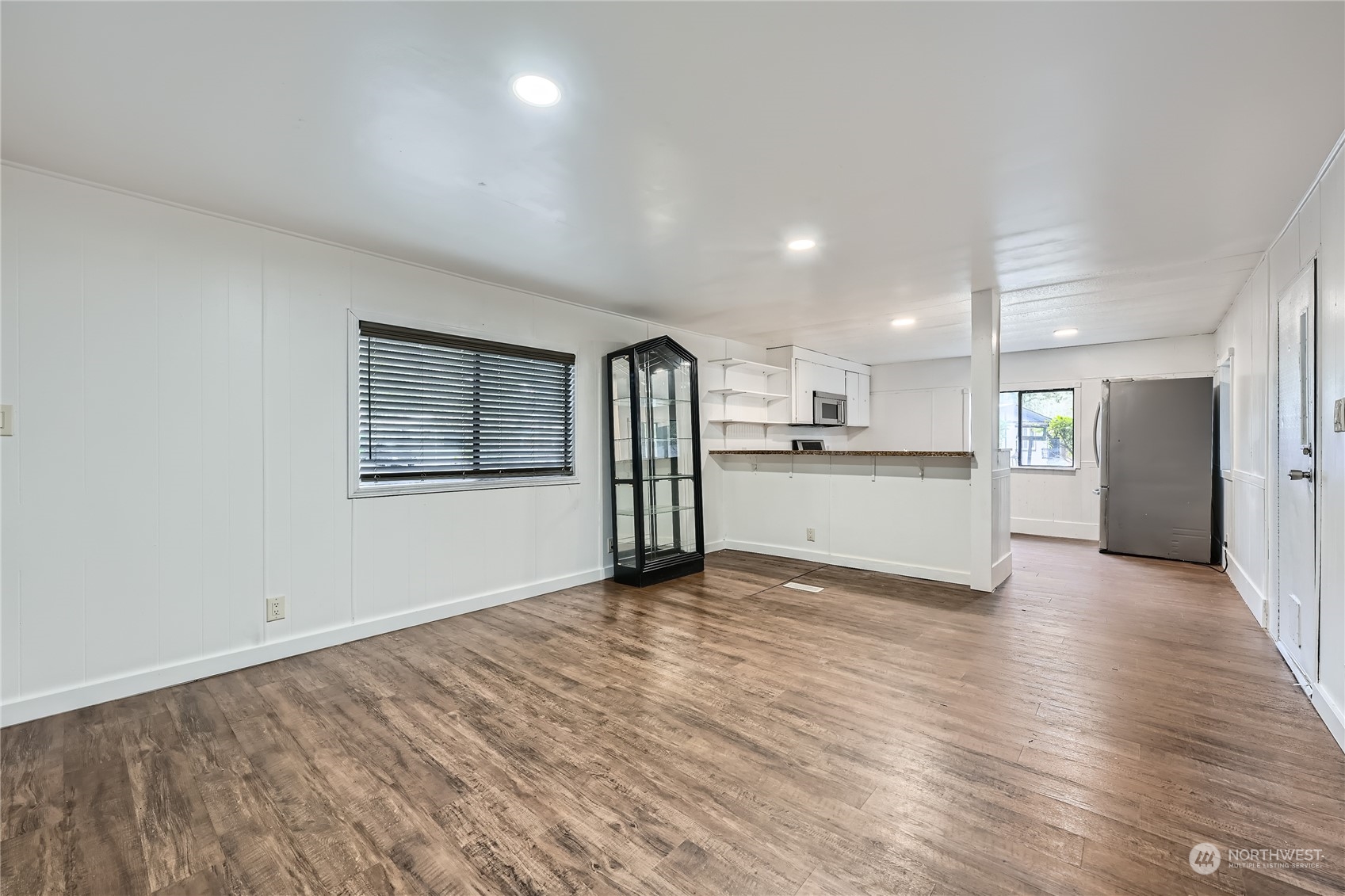 1332 192nd Street Southeast, Unit 17 Bothell, WA 98012 - Photo 7 of 24 a view of a kitchen with a sink and a stove top oven