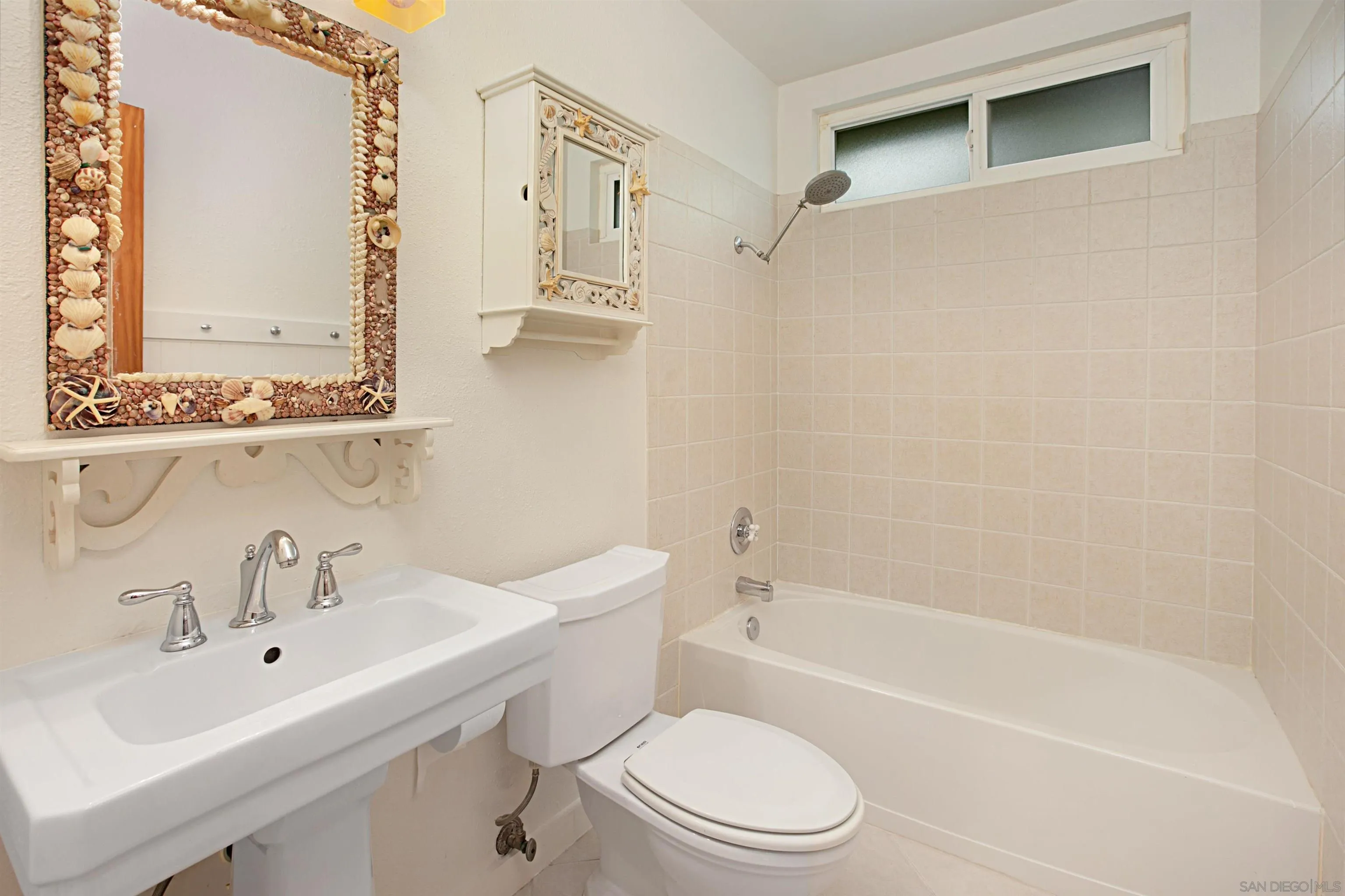 244 Rosebay Drive Encinitas, CA 92024 - Photo 10 of 15 a bathroom with a sink toilet and shower