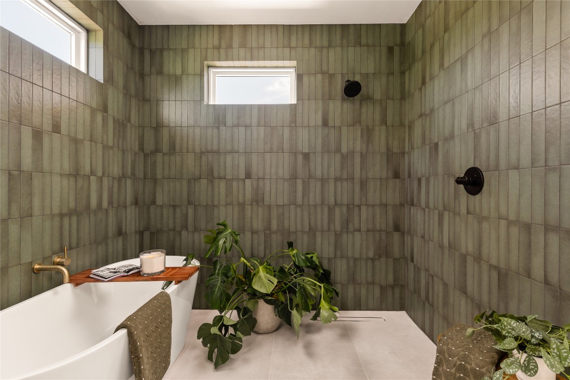 4530 Clawson Road, Unit 1 Austin, TX 78745 - Photo 22 of 24 Full bathroom featuring tiled shower and a freestanding bath