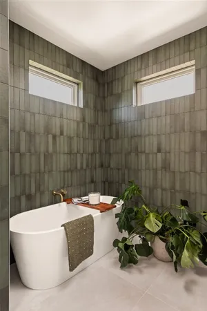 a bath tub sitting in a bathroom
