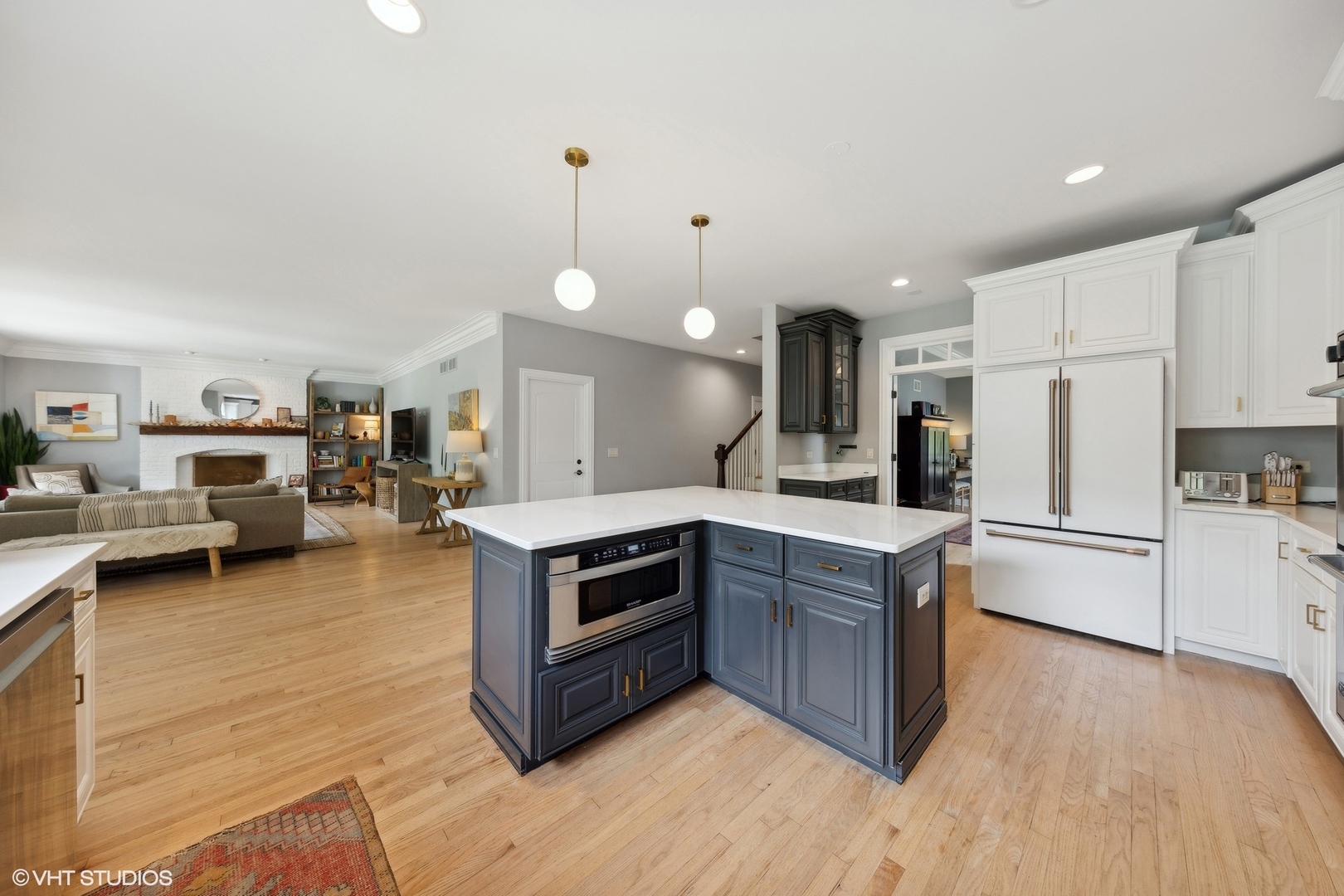 N491 Peter Road Winfield, IL 60190 - Photo 13 of 55 a kitchen with sink a microwave and cabinets