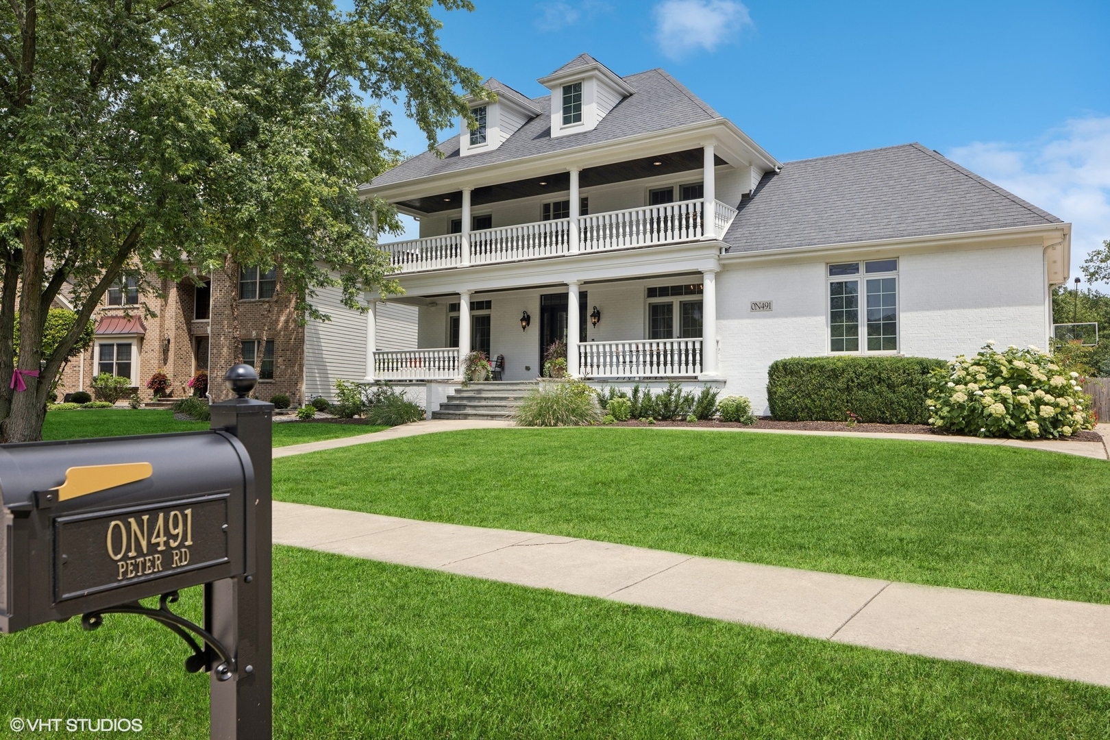 N491 Peter Road Winfield, IL 60190 - Photo 2 of 55 a front view of house with yard and green space