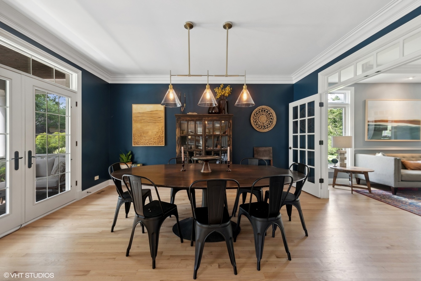 N491 Peter Road Winfield, IL 60190 - Photo 21 of 55 a view of a dining room and livingroom with furniture wooden floor and a chandelier