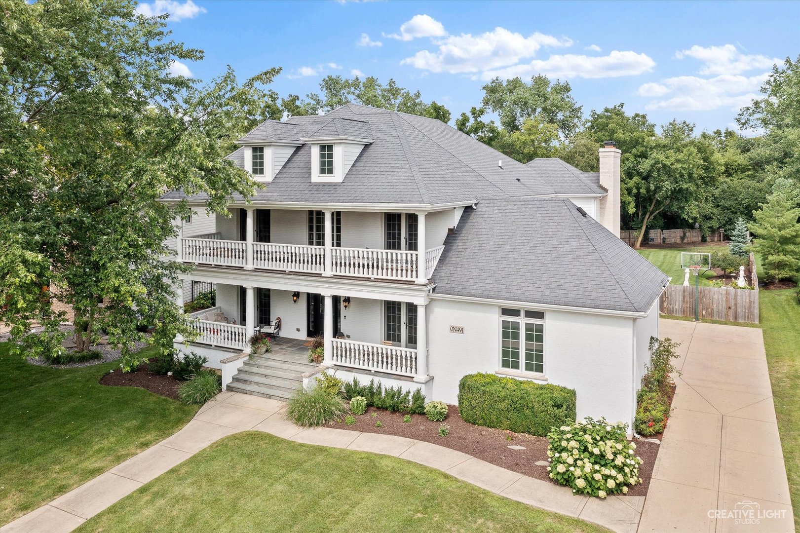 N491 Peter Road Winfield, IL 60190 - Photo 3 of 55 a front view of a house with a yard