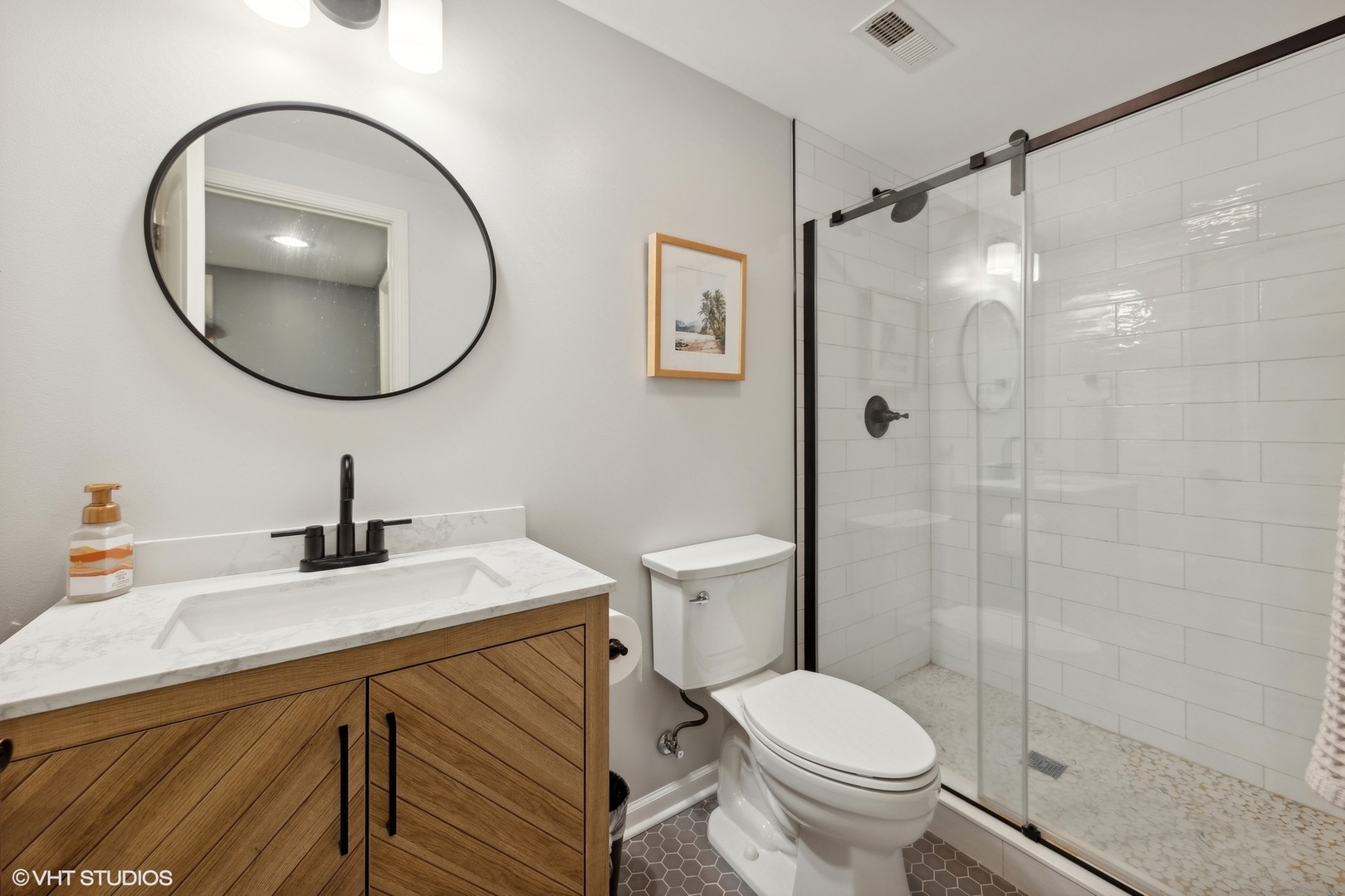 N491 Peter Road Winfield, IL 60190 - Photo 45 of 55 a bathroom with a sink a mirror a toilet and a shower