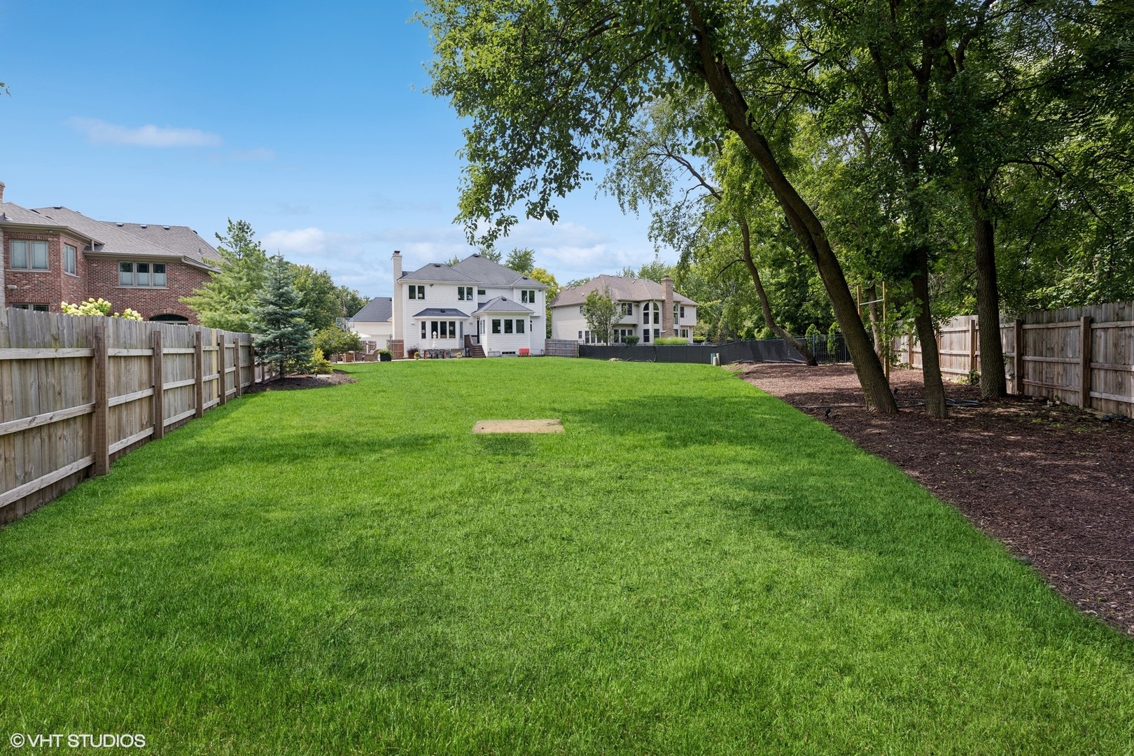 N491 Peter Road Winfield, IL 60190 - Photo 5 of 55 a view of a big yard next to a house