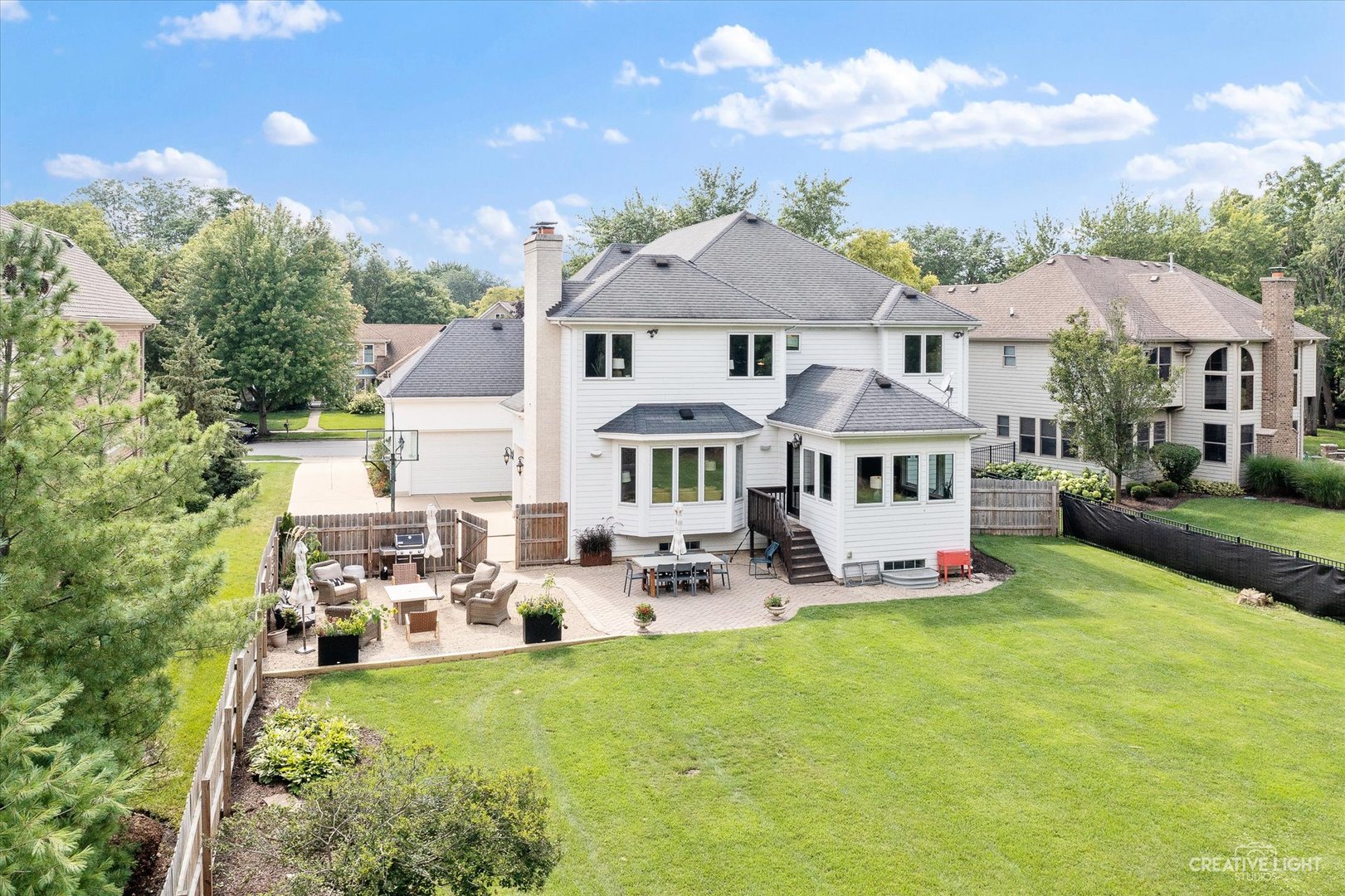 N491 Peter Road Winfield, IL 60190 - Photo 7 of 55 a view of a house with a big yard and sitting area