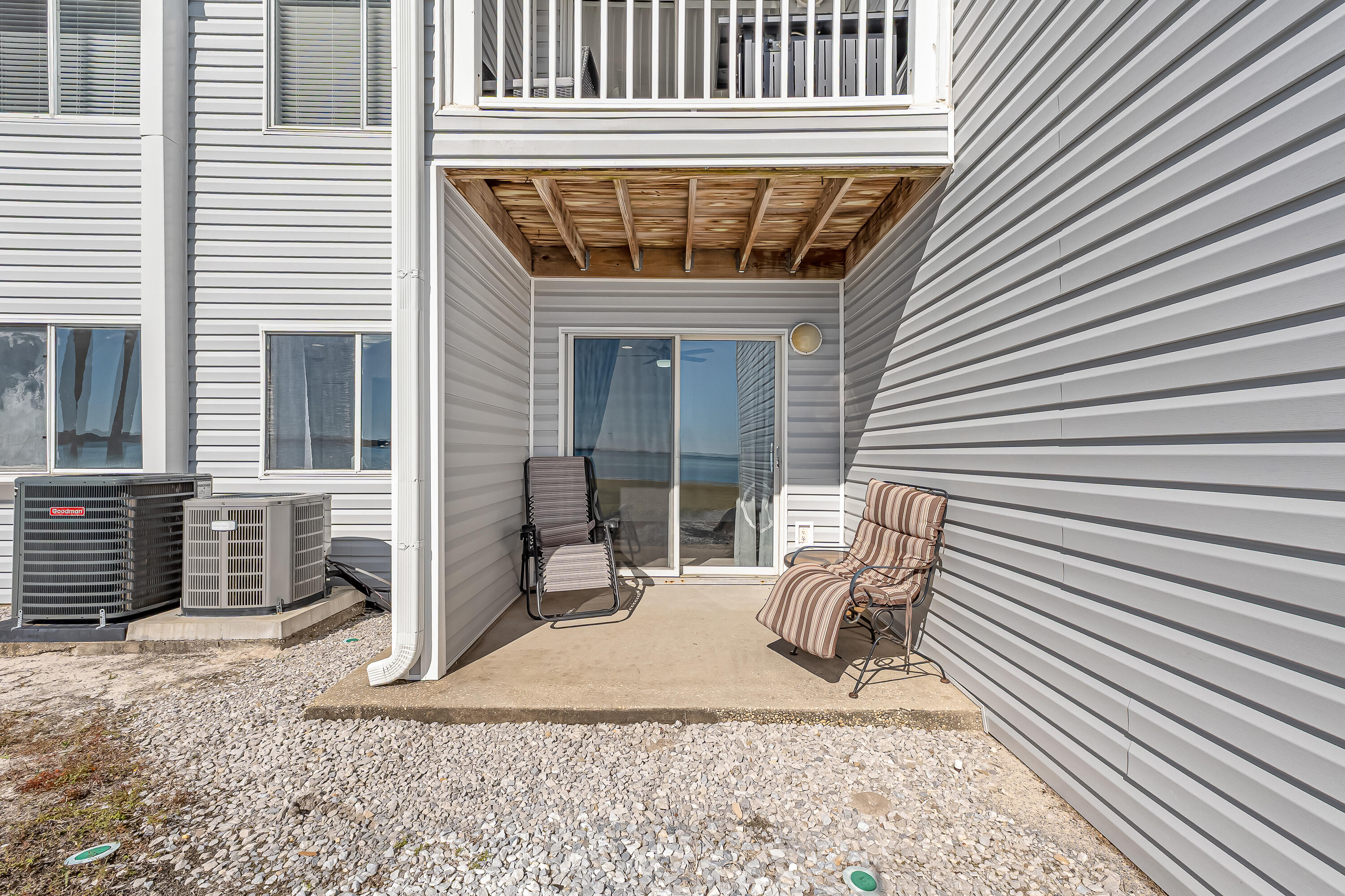 101 Old Ferry Road, Unit 20B Shalimar, FL 32579 - Photo 26 of 30 a view of a porch with a bench