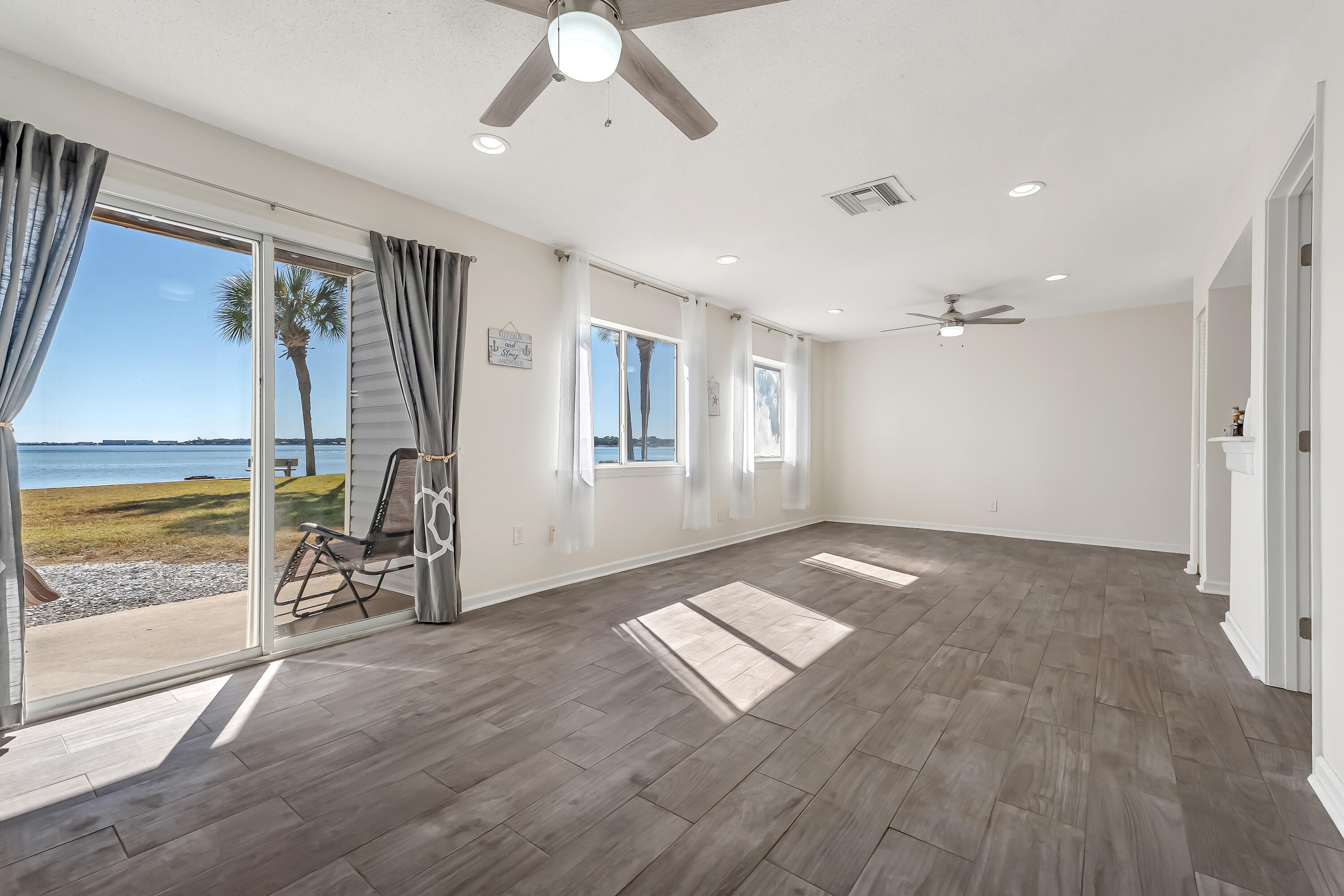 101 Old Ferry Road, Unit 20B Shalimar, FL 32579 - Photo 10 of 30 a view of an empty room with a window