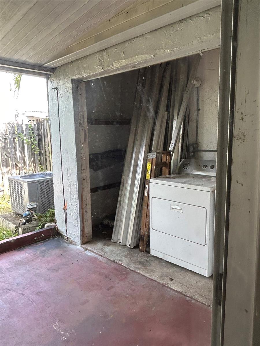 Mango Hill Hialeah, FL 33012 - Photo 5 of 18 a view of an empty room with a fireplace