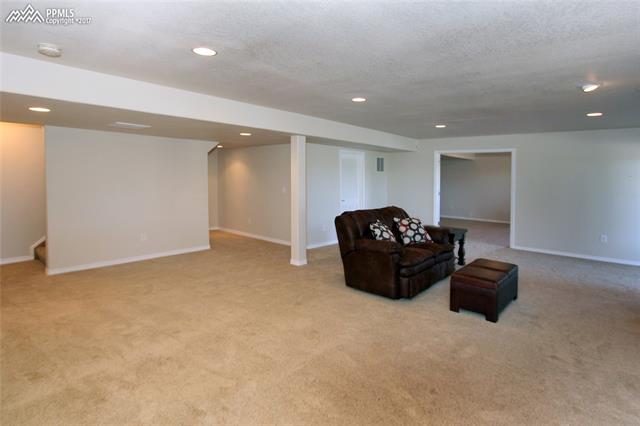 12010 Rio Secco Road Peyton, CO 80831 - Photo 20 of 36 Office is located just behind the staircase, mechanical room and a large bedroom with french doors
