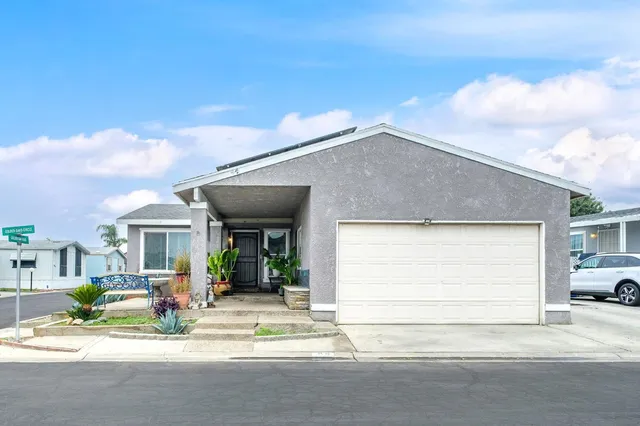 a view of a house with a patio