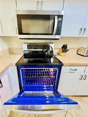 a view of front door with wooden floor