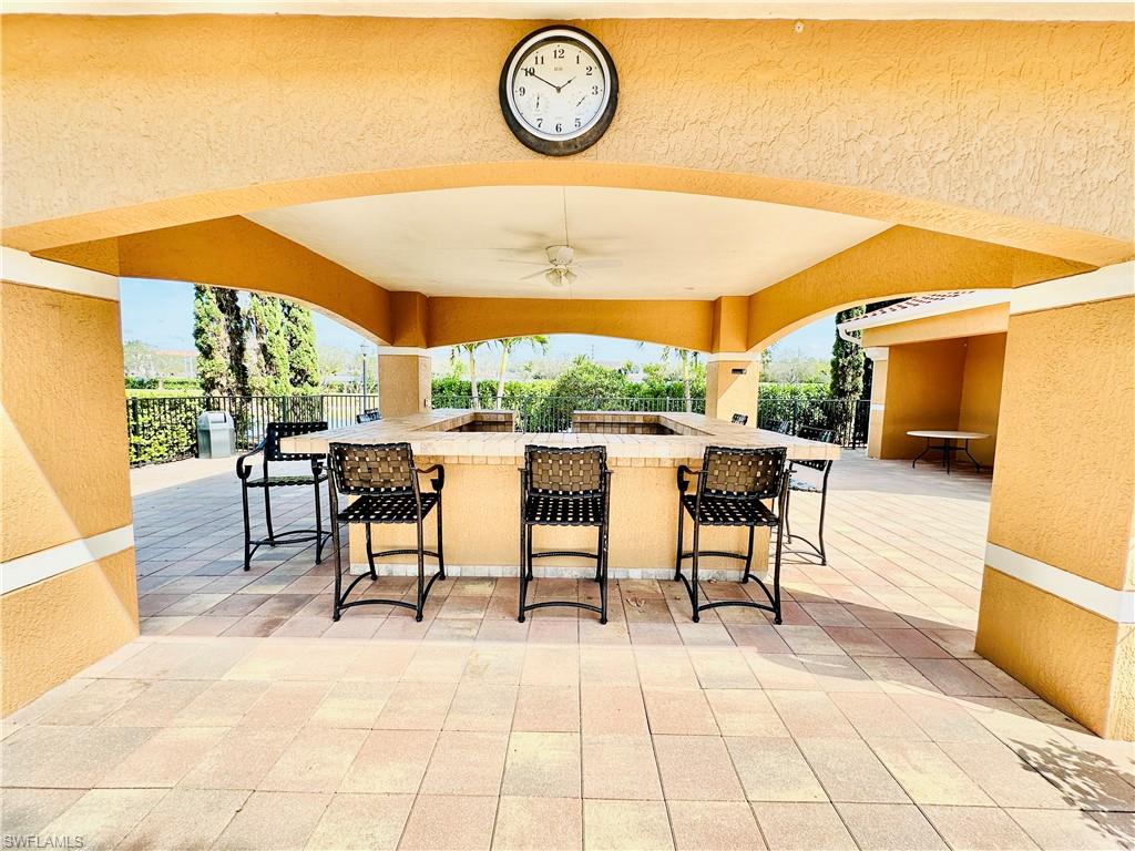 1820 Florida Club Circle, Unit 2210 Naples, FL 34112 - Photo 27 of 37 View of patio / terrace