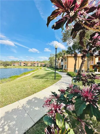 a view of a lake with a big yard