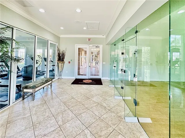 an empty room with wooden floor