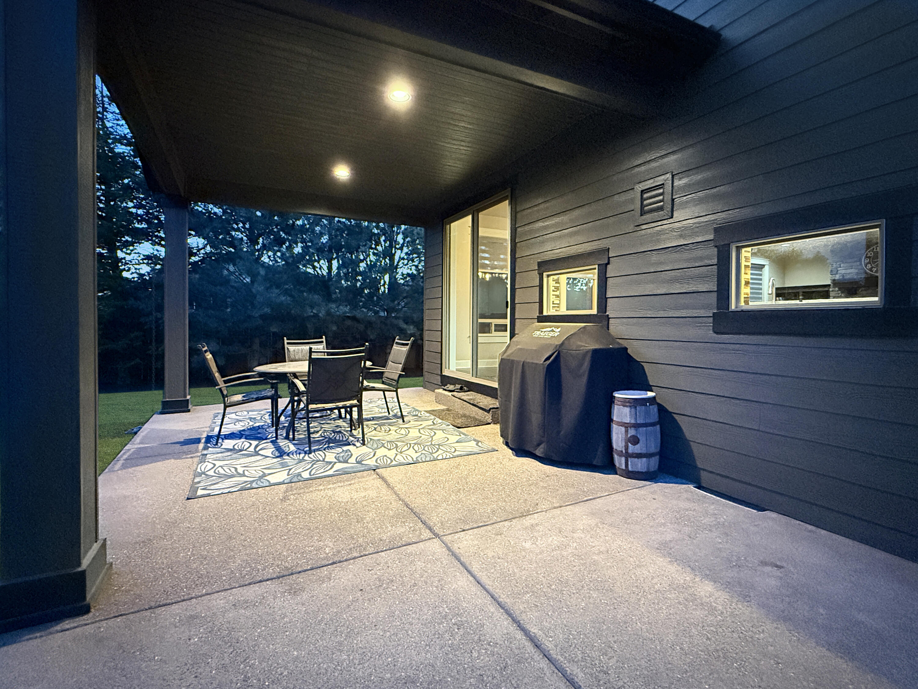 61072 Manhae Loop Bend, OR 97702 - Photo 47 of 63 a view of a chairs and table in a patio
