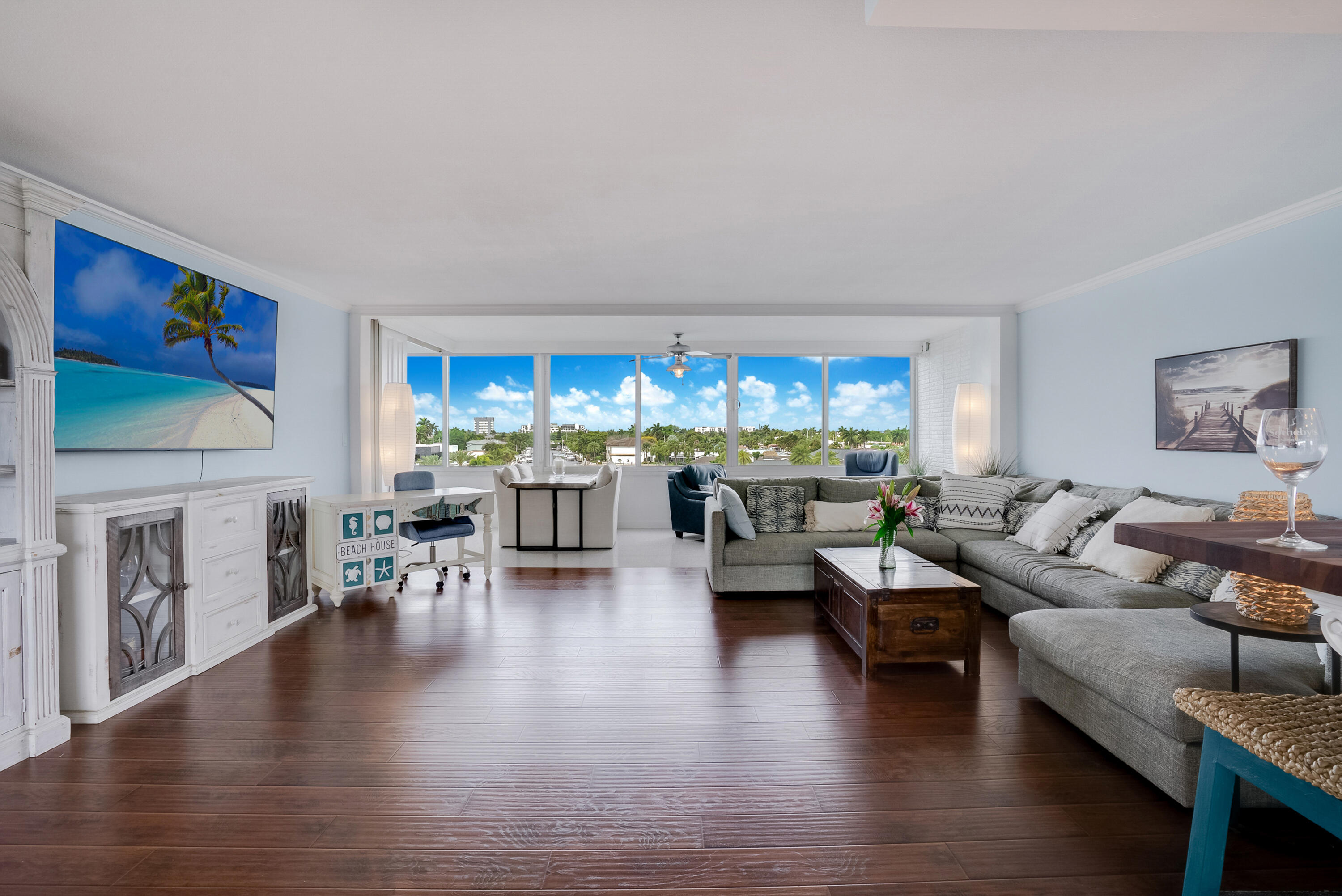 201 North Riverside Drive, Unit 402 Pompano Beach, FL 33062 - Photo 11 of 30 a living room with furniture and a fireplace