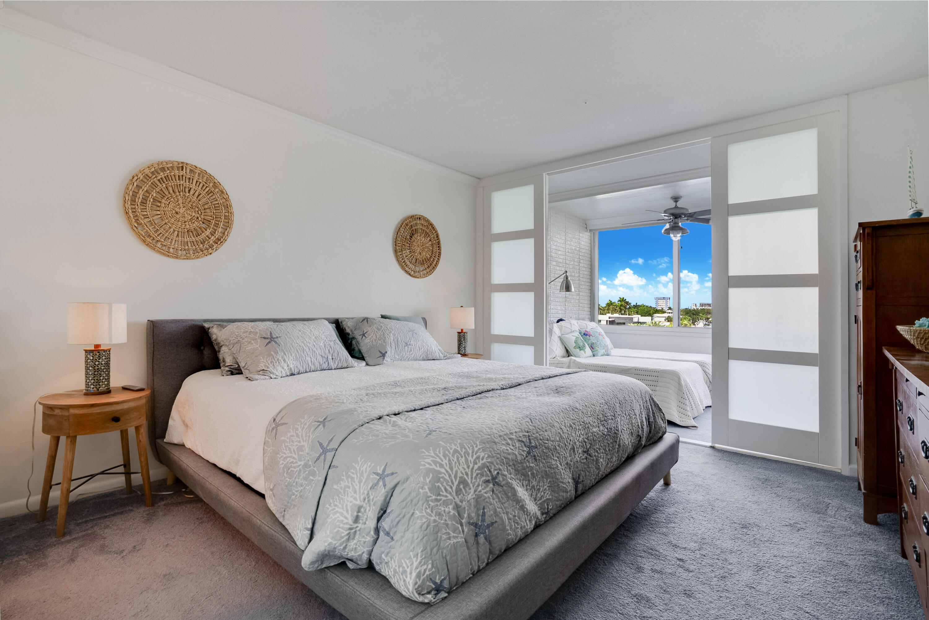 201 North Riverside Drive, Unit 402 Pompano Beach, FL 33062 - Photo 14 of 30 a bedroom with bed and a window