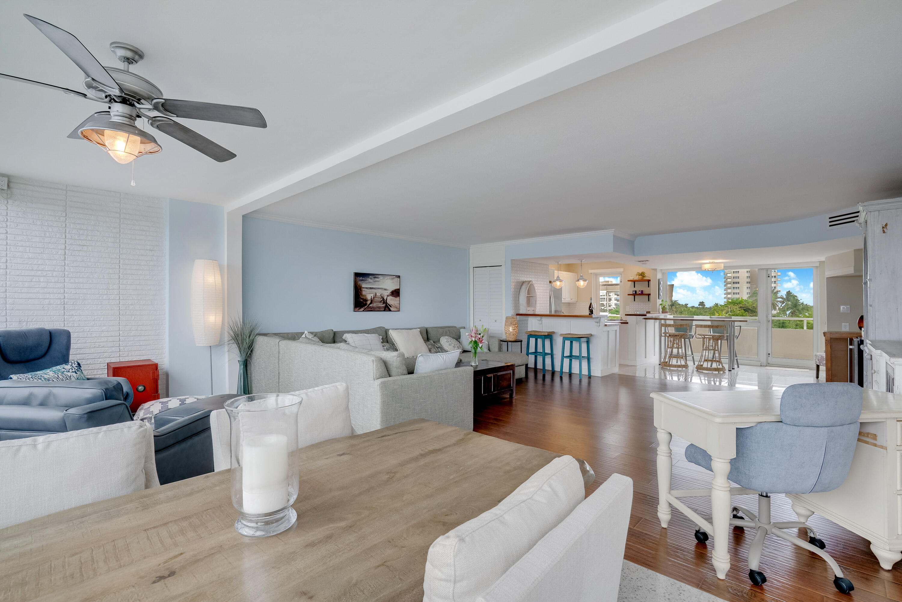 201 North Riverside Drive, Unit 402 Pompano Beach, FL 33062 - Photo 17 of 30 a living room with furniture and a wooden floor