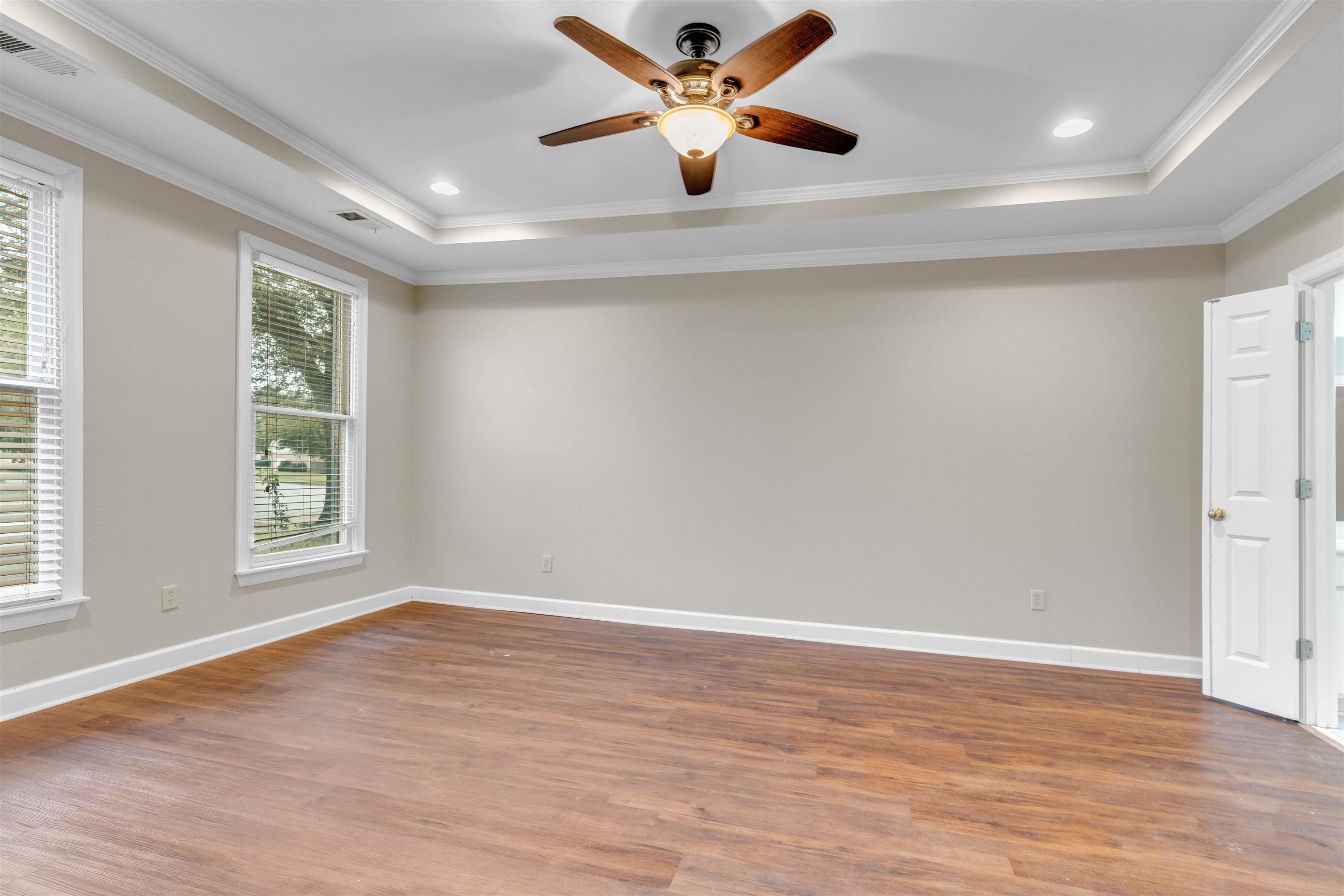 1335 Riding Brook Drive Collierville, TN 38017 - Photo 10 of 32 wooden floor in an empty room with a window