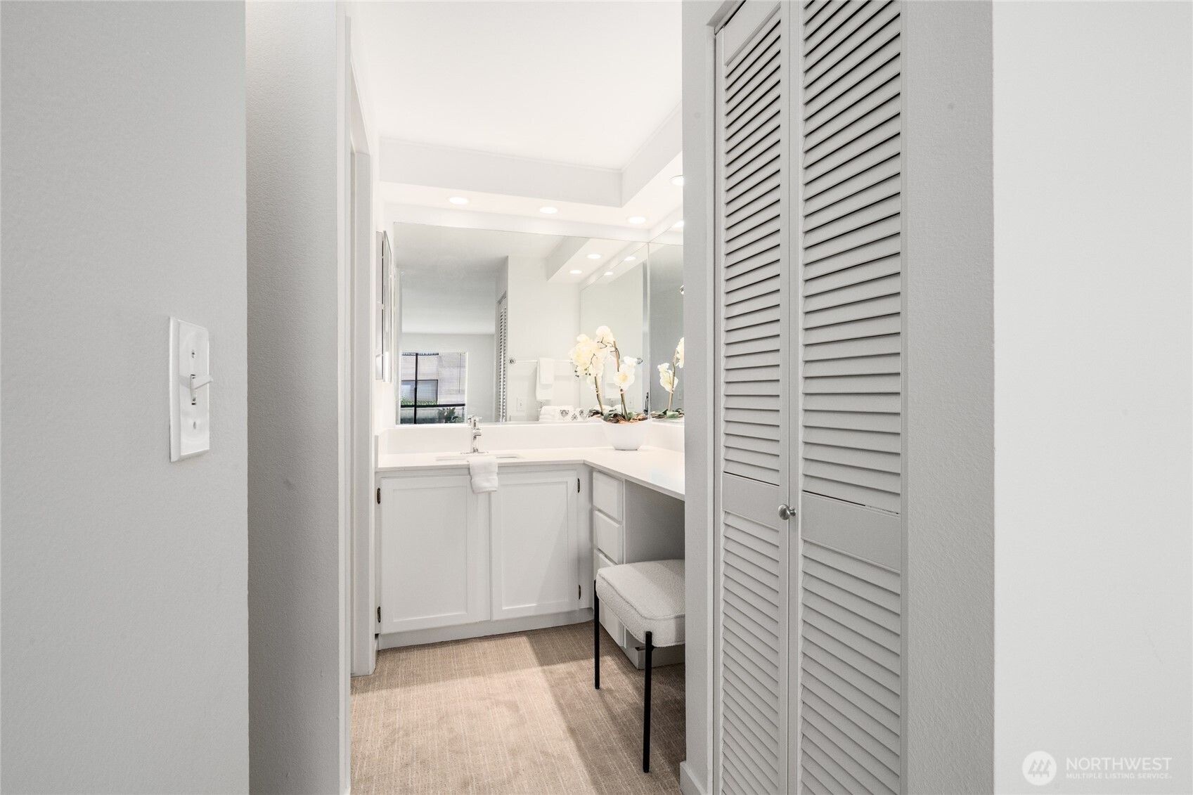 410 West Roy Street, Unit E101 Seattle, WA 98119 - Photo 22 of 33 a bathroom with a sink a toilet and shower