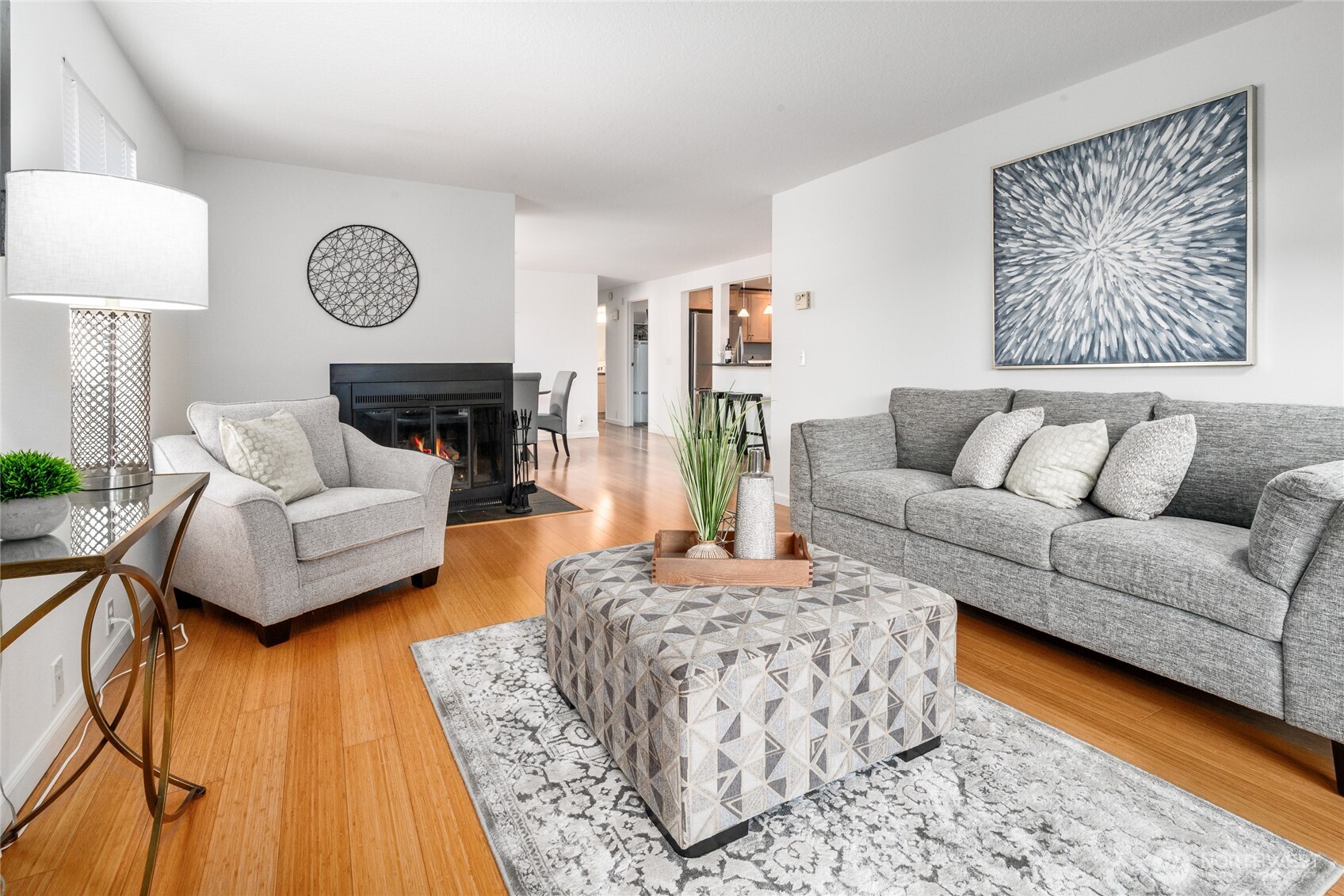 410 West Roy Street, Unit E101 Seattle, WA 98119 - Photo 5 of 33 a living room with furniture and a couch